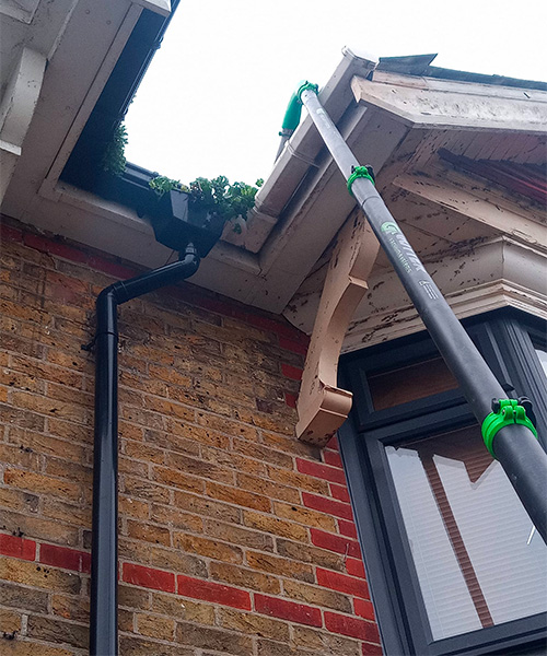 Cleaning gutters on domestic property