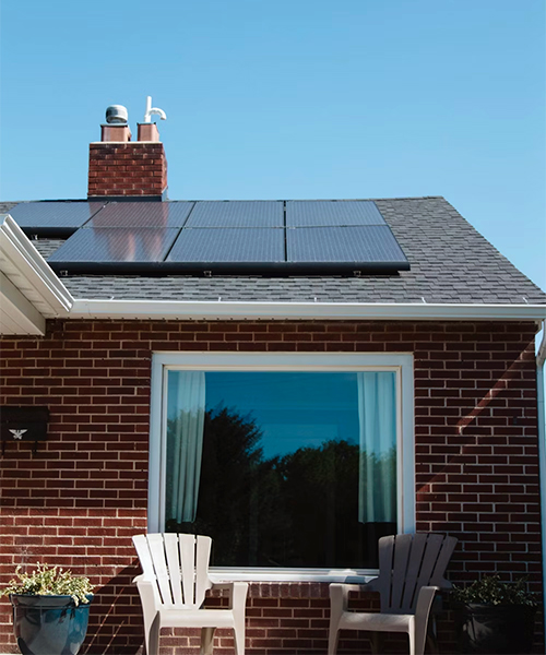 Solar panels on roof of a house looking clean