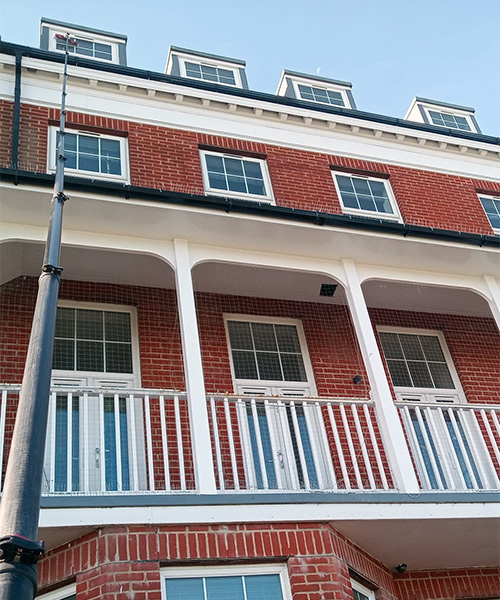 Domestic window cleaning block of apartments